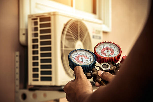 Professional Hvac technician working in Raeford, NC